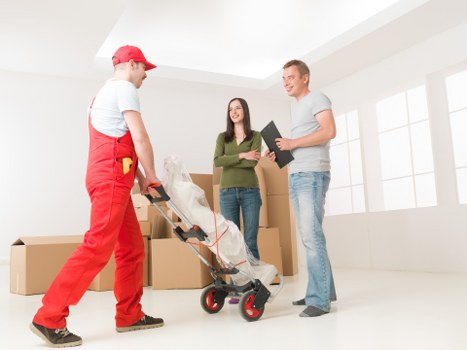 Moving van and driver preparing for a local collection and delivery service