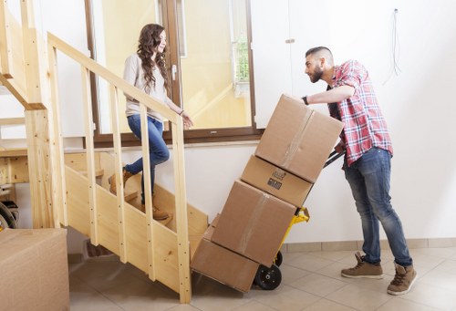 Boxes and furniture being loaded for Sutton removals
